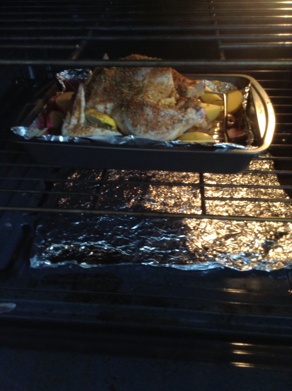 Into the oven it goes! Cook the chicken for an hour or so (though this depends on the size of your chicken) until done. Use a meat thermometer if you have one - internal temperature of 180\u00b0 F (82\u00b0 C).