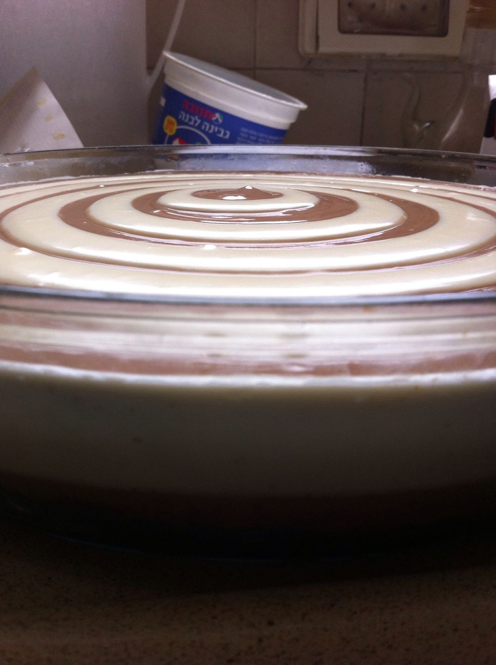into the oven! Youll know when its ready when only the center is a bit jello'ish. Dont worry it will stiffen up after chilled. I reccomand you to check it after an hour Just in case its ready.