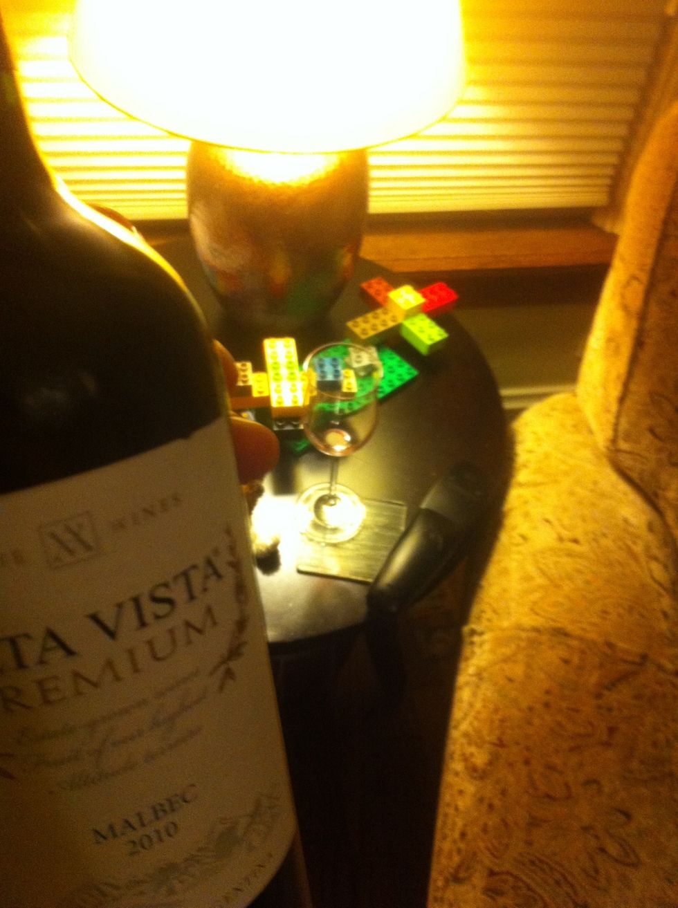 Introduce bottle to primed and worried looking wineglass, use a fun introduction like "Here's Johnny!" or "look out below!" or something that's actually clever to calm the glass.