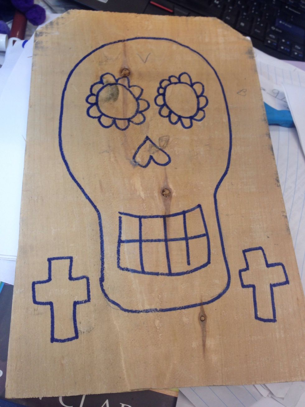 Introduce D\u00eda de Los Muertos to the students and model drawing a calavera. The drawing should be simple. Tell them to draw a lightbulb for the shape of the head. They come up with unique drawings!