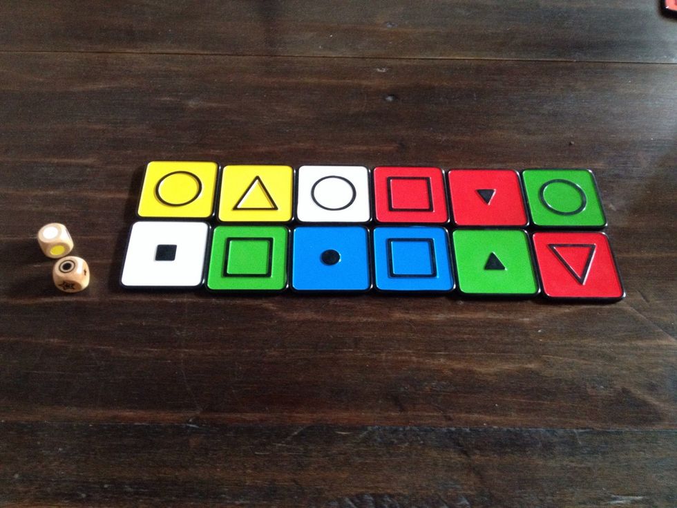 Introduce the dice. (If you're playing the game variant described in the instructions, introduce the ladder tiles on this step.)