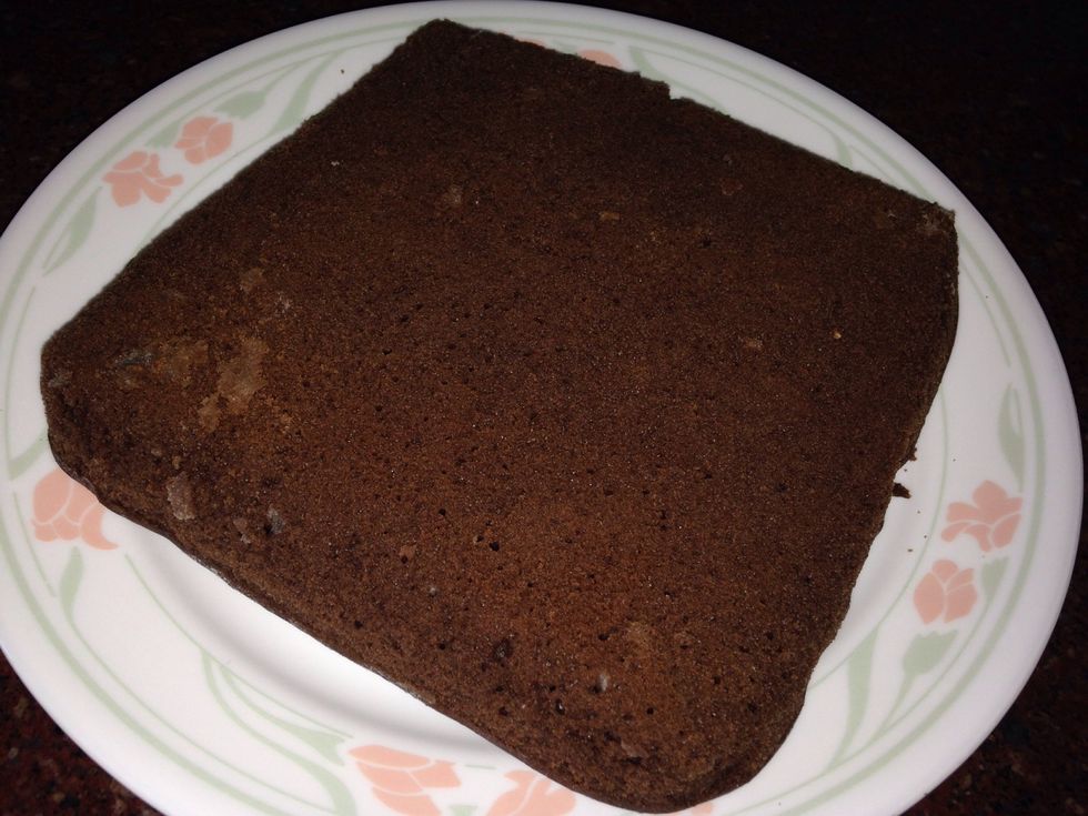 invert the baking tray on dish so that cake comes out inverted
