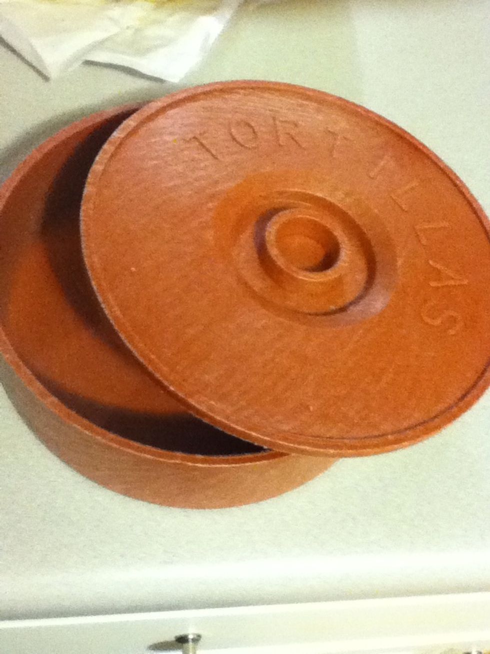 Invest in one of these at your local Bed Bath & Beyond. It'll keep your tortillas from going stale for several days.