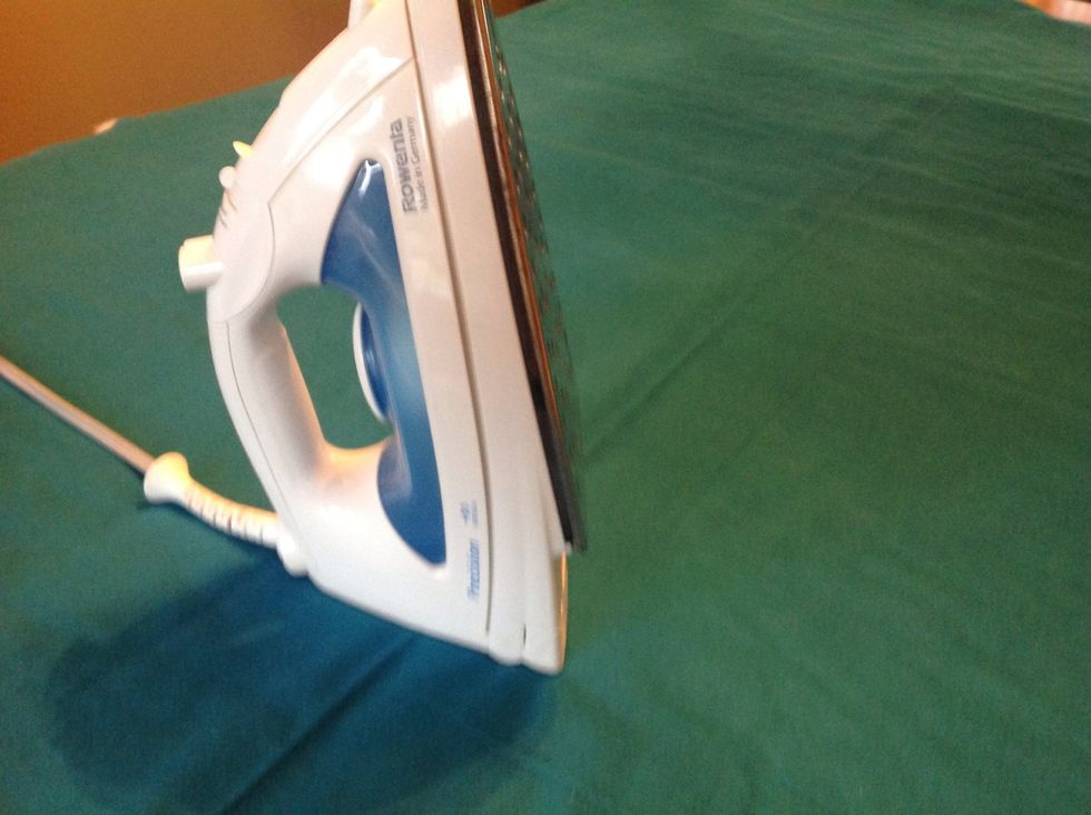 Iron out creases in fabric so that it is flat and will not bunch.