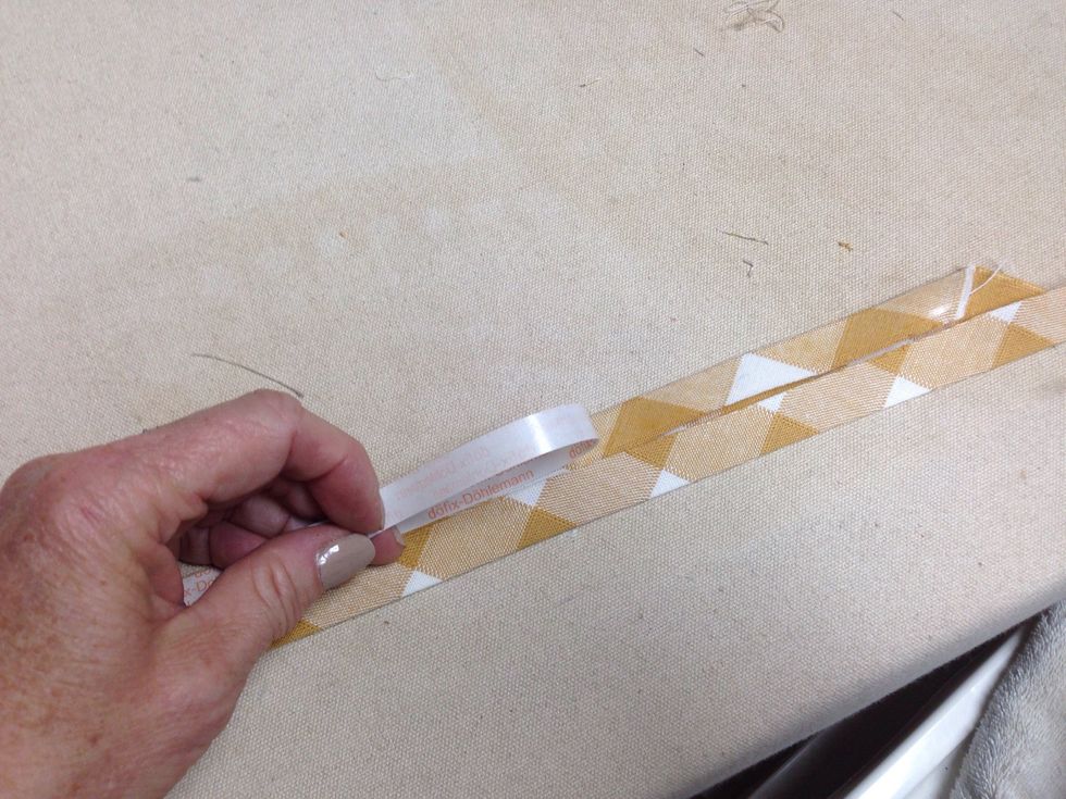 Iron Steam-A-Seam-II on ONE side of each the bias banding strip as shown then remove paper.