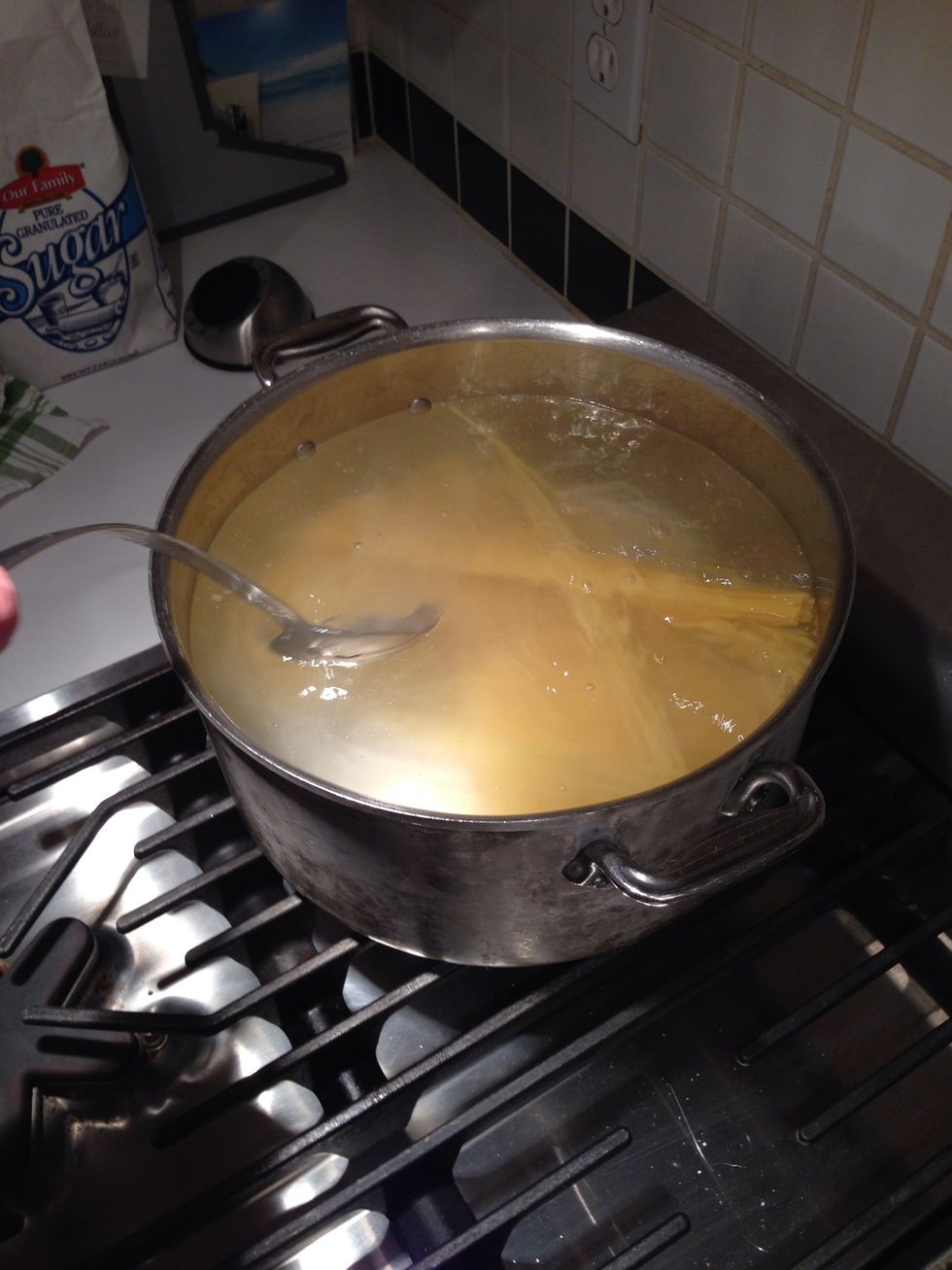 Is time to put in the pasta? Did you do the math? Dump it in, along with some salt, and stir. I have a friend who stirs constantly, but I think she's paranoid. Occasionally will do. Set the timer.