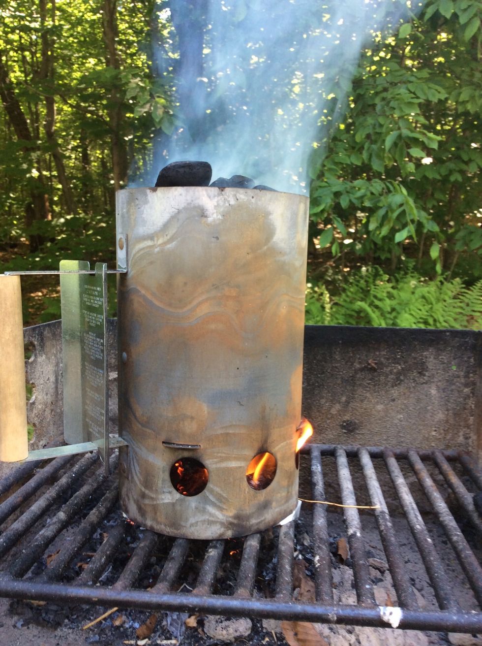 It does take longer to get the coals white when using this method, but it does make it easier to handle and move the coals around to where you need them later.