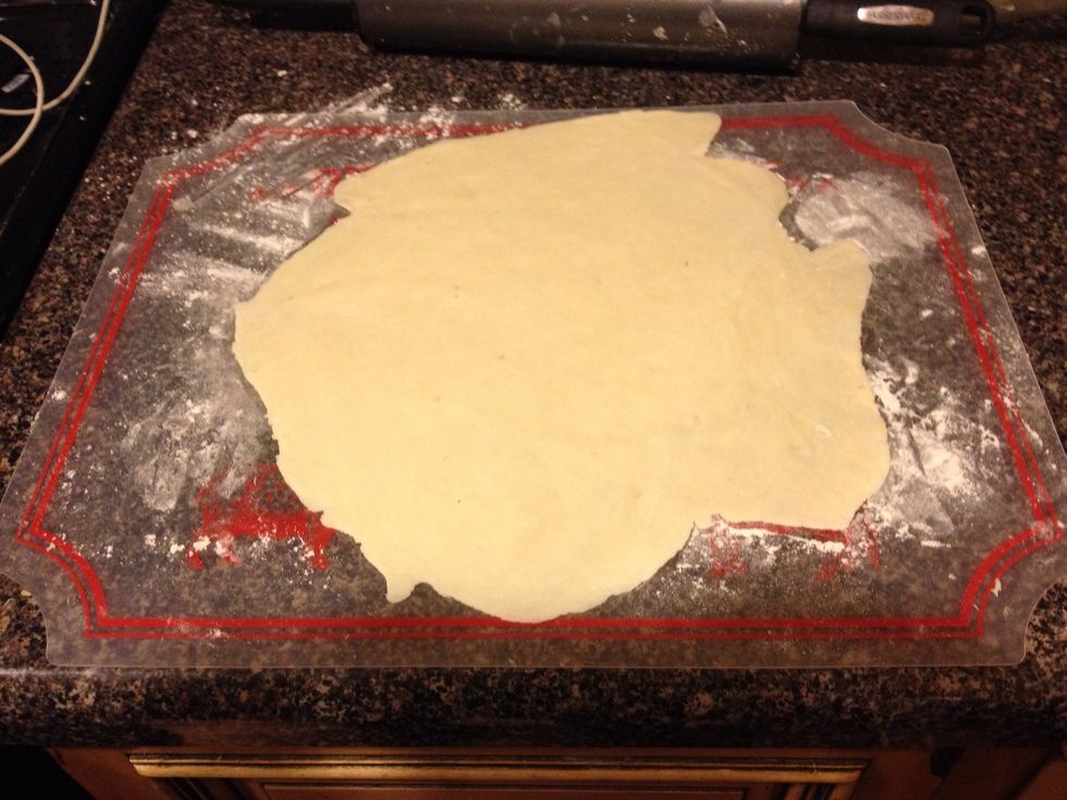 It doesn't have to be a perfect circle, just large enough to fit into your nine-inch pie crust pan!
