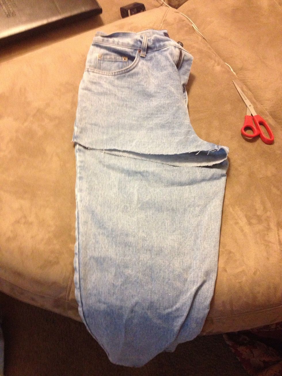 It doesn't really matter how straight you cut them (that can add to the rugged effect). Make sure that both legs are right around the same lengths by cutting the second leg from the first leg.