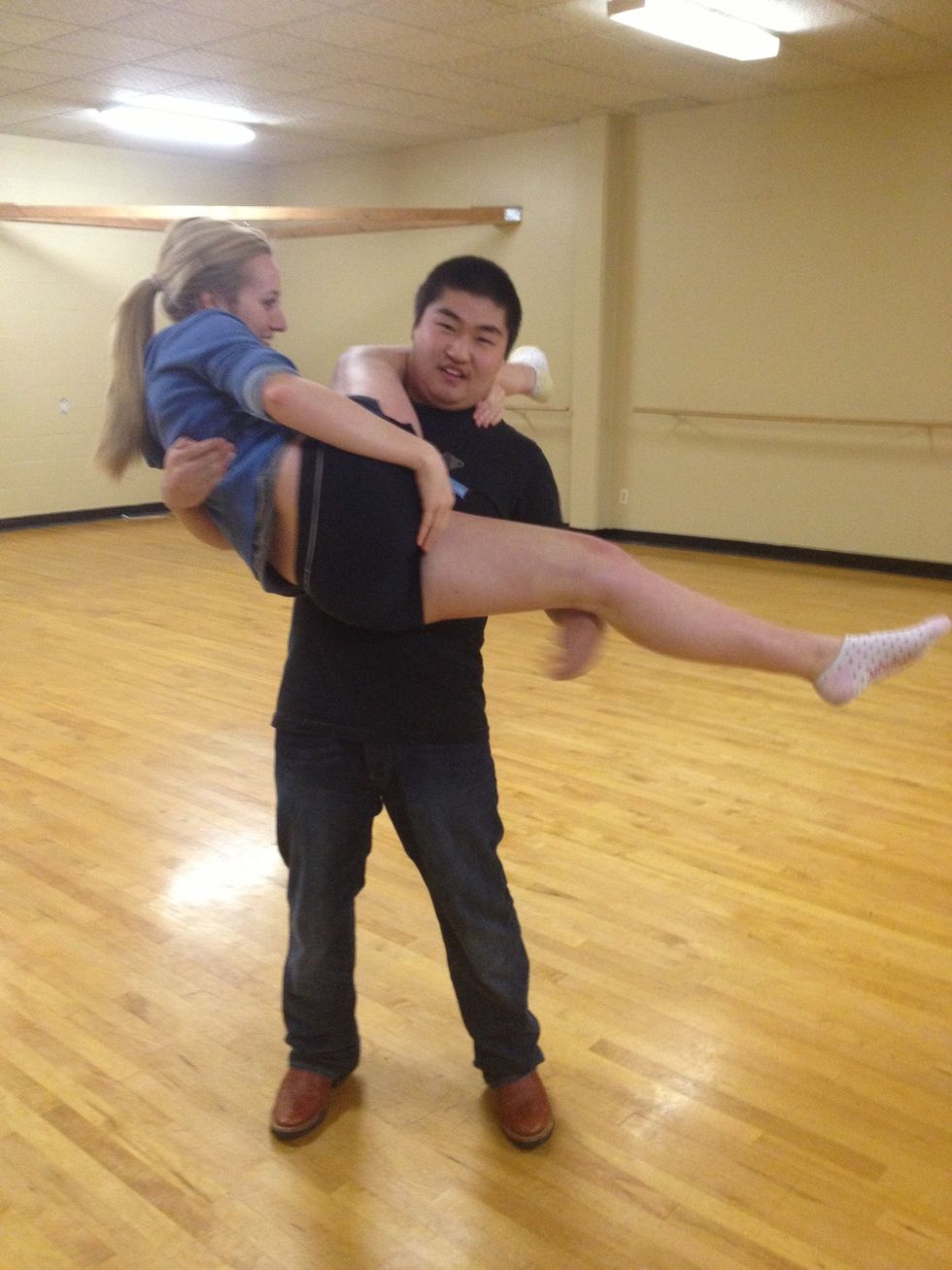 It helps to put your left hand on her thigh and push her leg down.