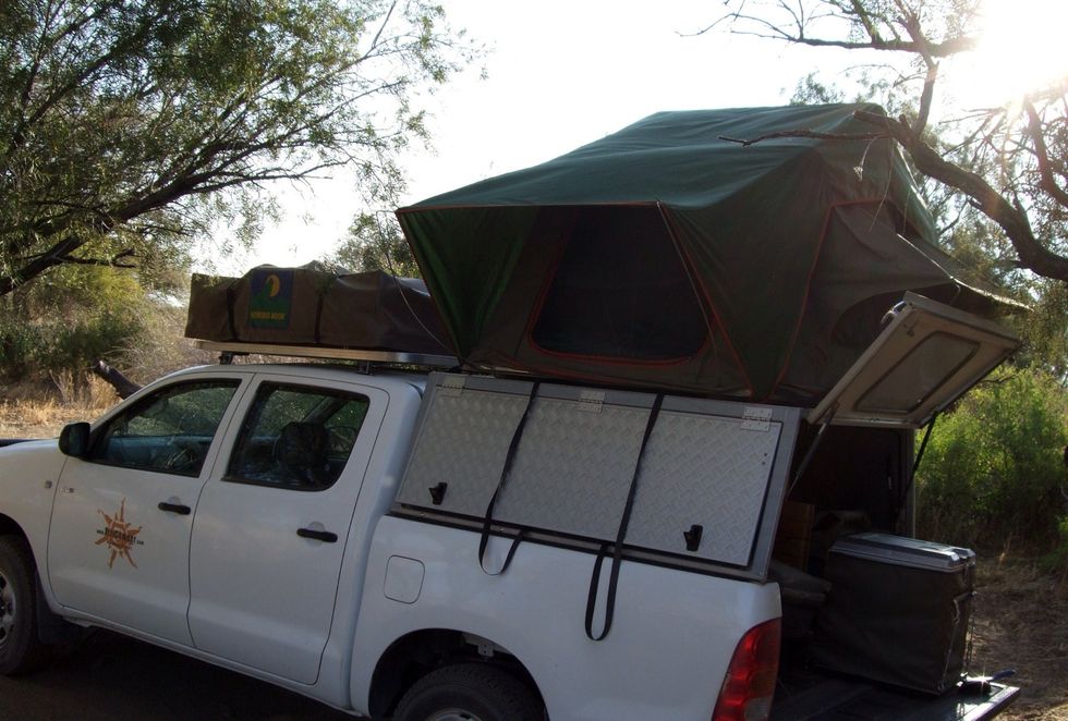 It is a pick-up truck with a roof tent and everything you need in the back to survive the next weeks