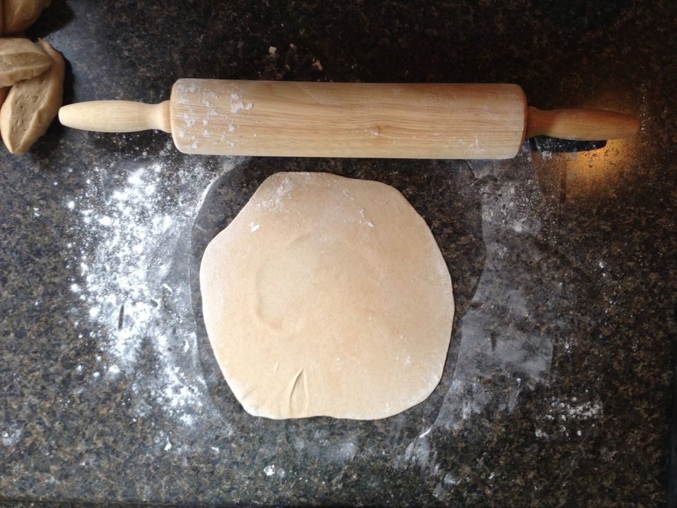 It is best to rotate the dough and flip it while rolling to get the best shape and thinnest tortilla. They will not be grocery-store perfect!