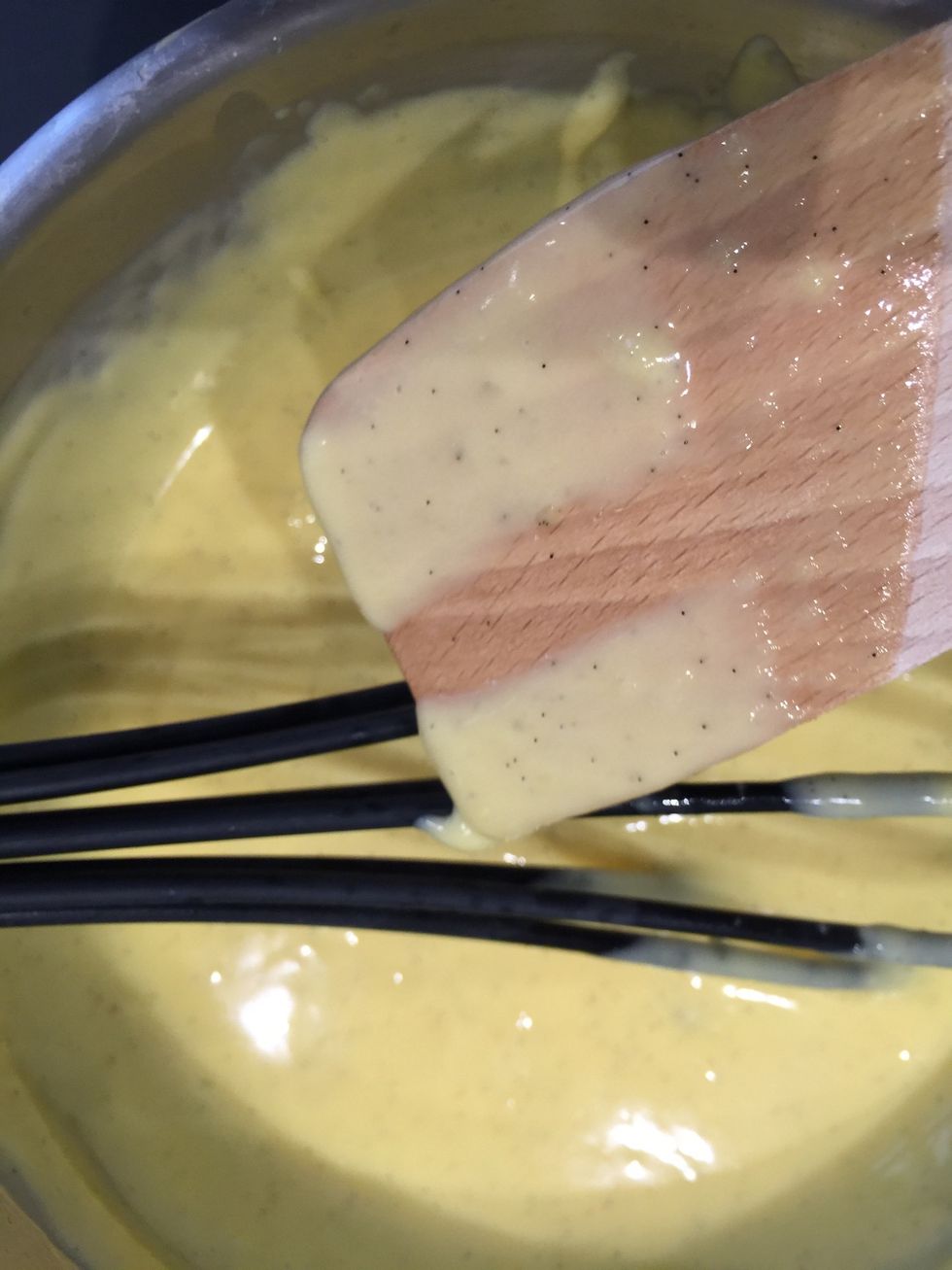 It is thick enough to coat the back of a wooden spoon and leave a trail