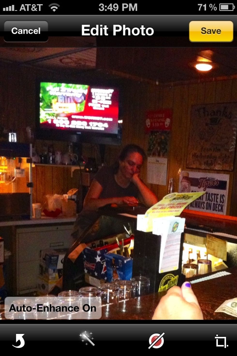 It'll adjust the lighting. The auto enhance is kinda touch and go for me. Sometimes it does improve an image but sometimes it doesn't. You can always undo by clicking cancel.