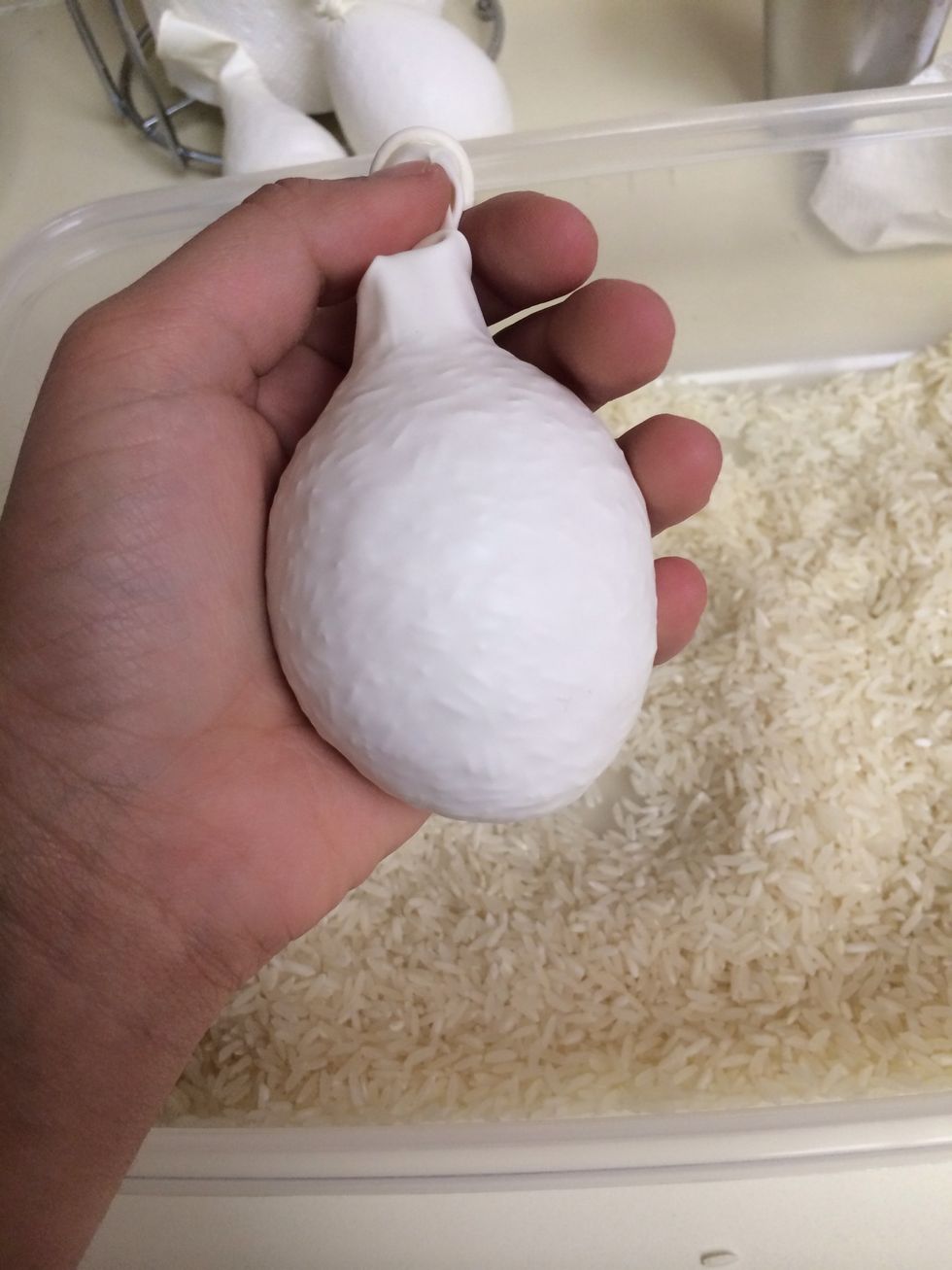 It looks sort of like a turnip at this point. I'm going to leave it at this much, but you can put more rice in or do less. It's your balloon!