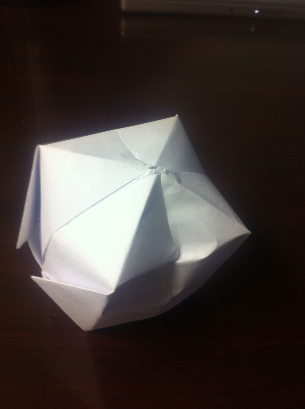 It may help to insert a straw into the hole to blow up your ballon. Your ballon will hold water if you are careful.