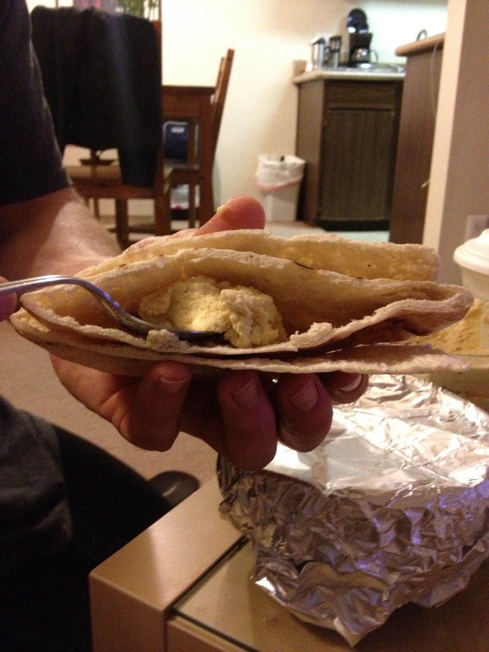 It's all about the pita!  These fell apart initially but still held up.   I doubled up on the pita  stuffing one inside the other.  Spread a good amount of hummus inside. Also make a bigger pocket.