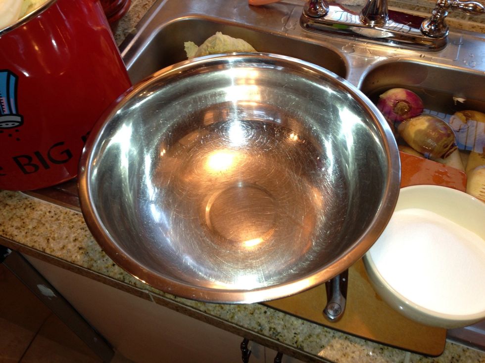 It's best to use a non metallic mixing bowl, but in a pinch this will work. Make sure you don't allow your salted items to sit in your bowl too long. It'll pit your bowl. & Completely AVOID aluminum!