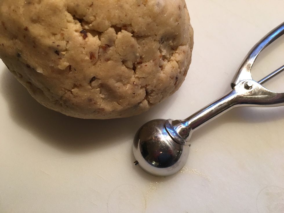 It's easier for me to work with the dough when I remove it from the mixing bowl. To measure the cookies, I use a small (#70) cookie scoop.