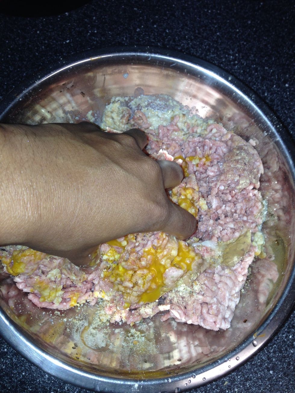 It's easier to just dig in there & mix with your hands \ud83d\udc50. When you have mixed it well, start forming your meatballs
