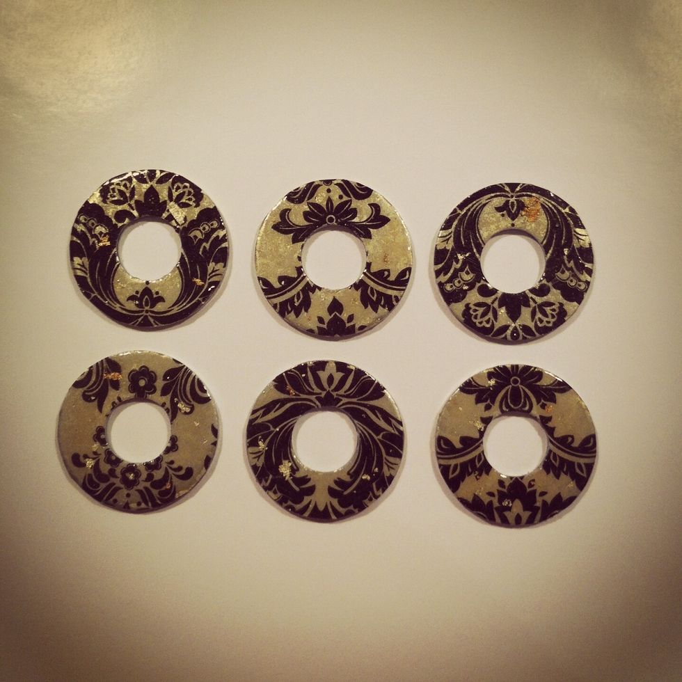 It's easy to do a bunch of these at a time. The wood varnish gives the washers a resin type finish plus a dated look.