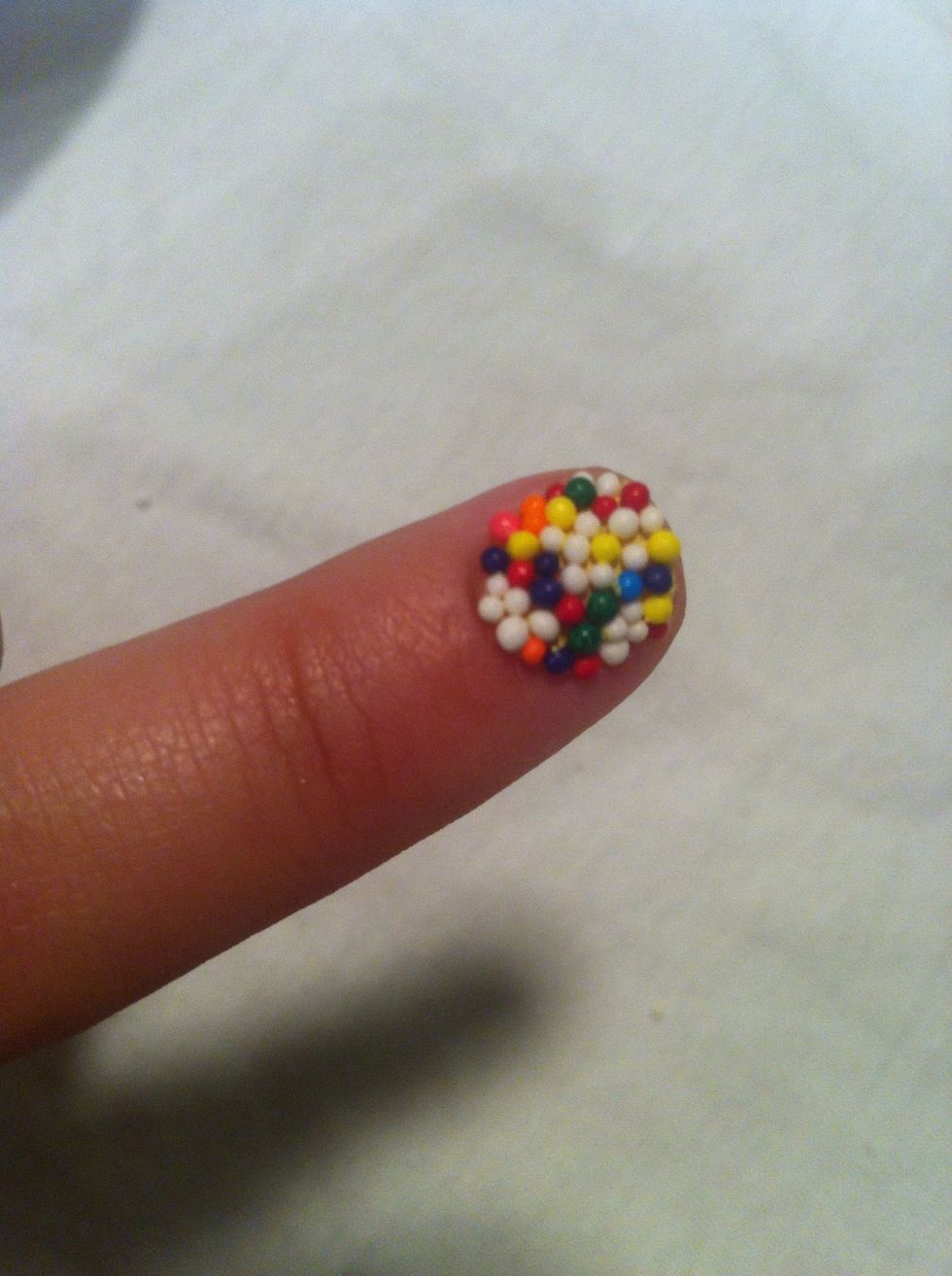 It's getting yummy! Move onto the next nail- paint, dip, shape. 1..2..3.. Then you move onto the thick top coat.