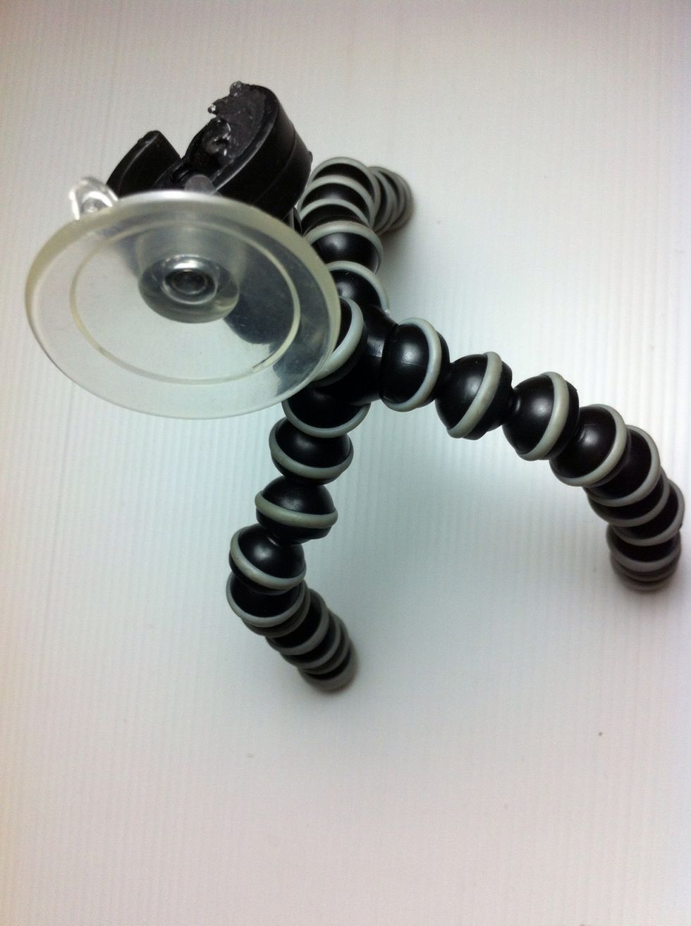 It's new mini gorilapod with iphone/ipad bracket and ready to use...:)  Enjoy it...!! \ud83d\ude04\ud83d\ude01