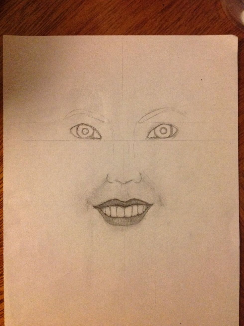 It's possible that you will need to fix some details in the smile, but it's normal. Mark the bridge of the nose, erase the lines and now we can make the shadows and the light of the face.