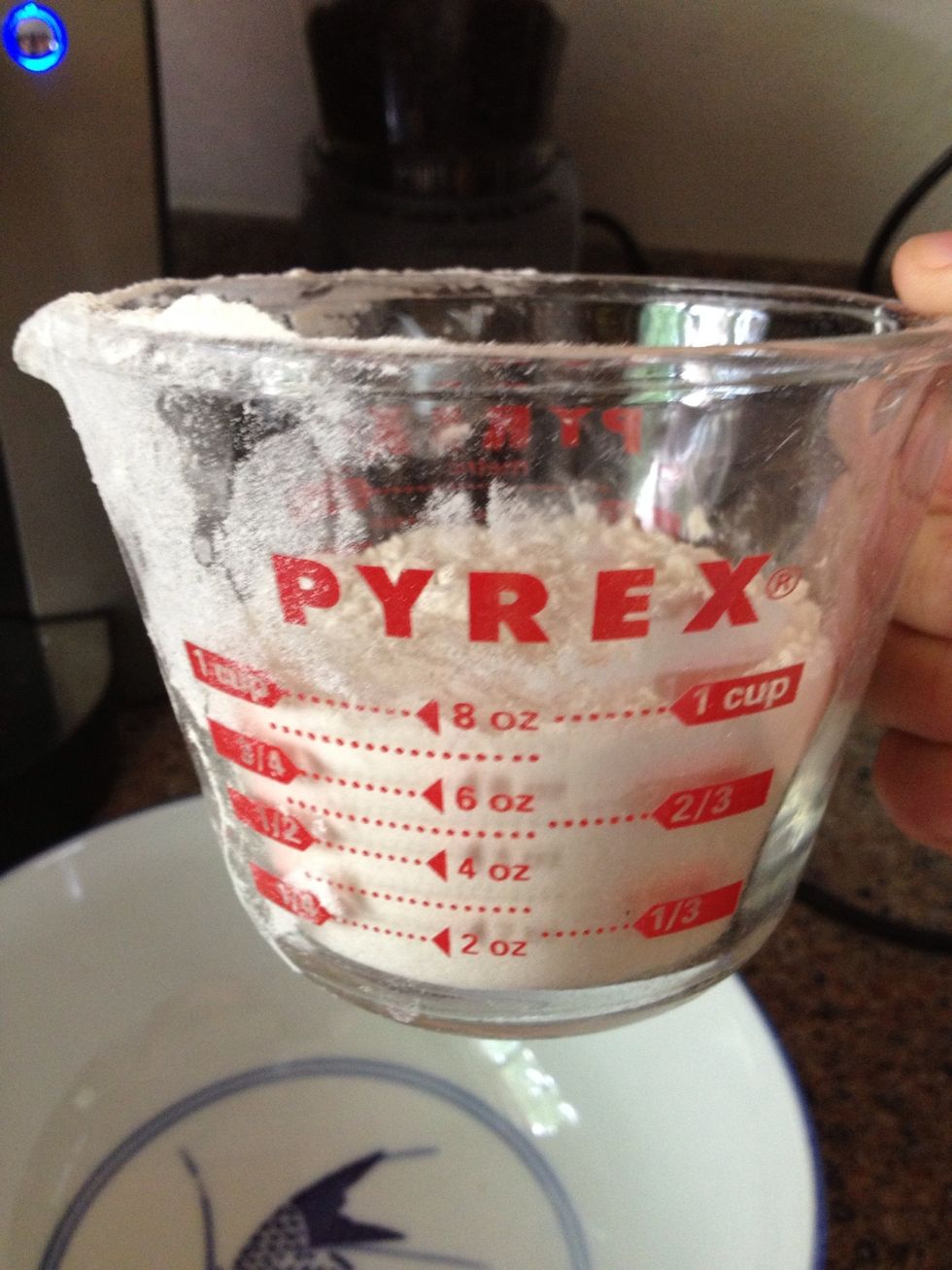 It's time for the flour, baking soda, and salt. First measure out 2 and 1/4 cups flour and put into a seperate bowl.