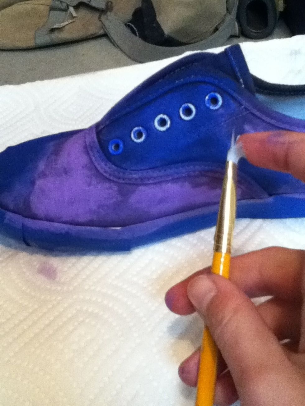 It's time for the stars so to do this you want the pull the brush back and then release causing it to splatter...