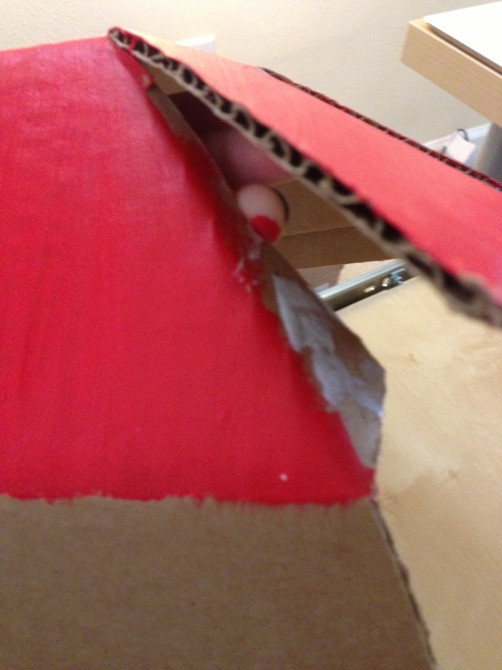 It's time to assemble the outside of the pocket fold in the tab that you created that isn't painted and glue it to the inside of the next panel