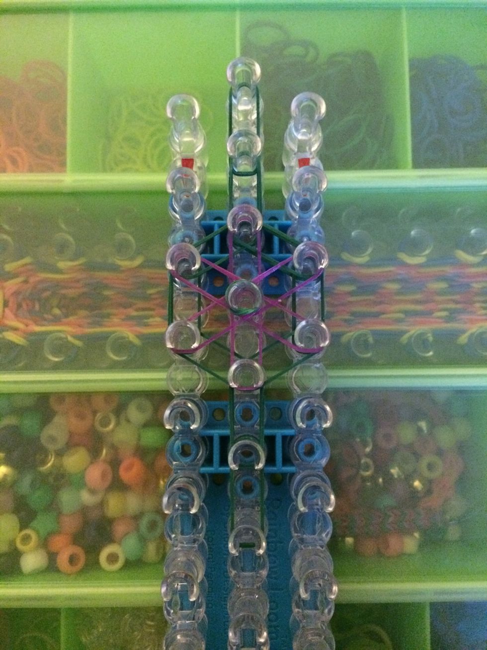 It's time to start looping. Flip your loom around and let's get to it :)