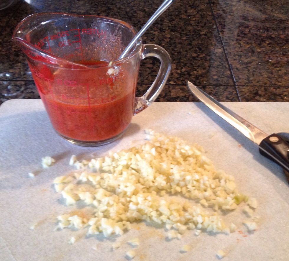 It's up to you about how much fresh, minced garlic you want to use. I like to use a whole head of garlic. I like the flavor. Mix all the minced garlic into the marinade. There should be about a cup.