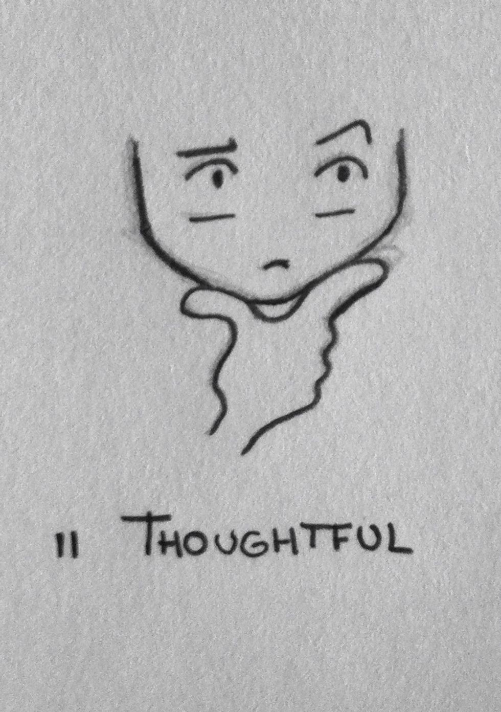 It seems like he is watching something, different shape for the eyebrows...