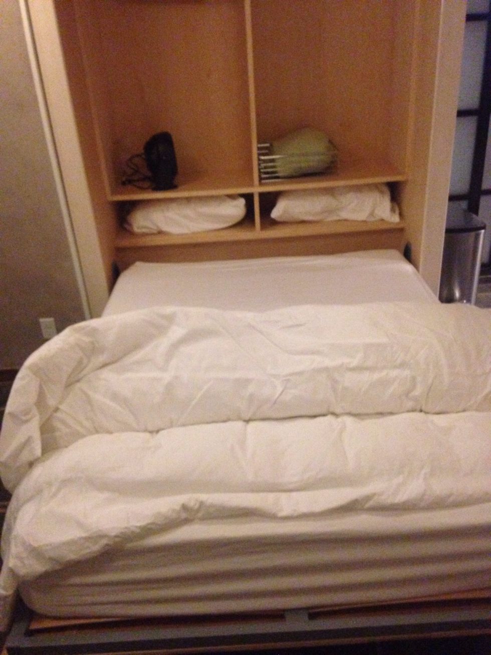 It should come down smoothly on its own once you pull