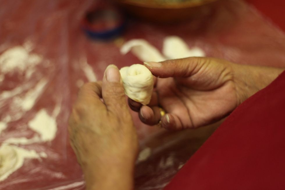 It should look a little like this. If not don't worry be creative. I'll still try your dumplings lol