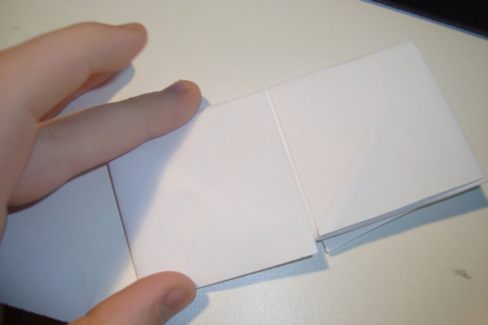 It should look like this once each side has been folded and creased!