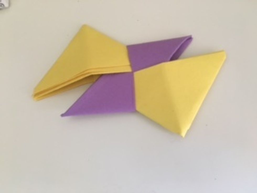 It should look like this, the flaps tucked into the pockets.