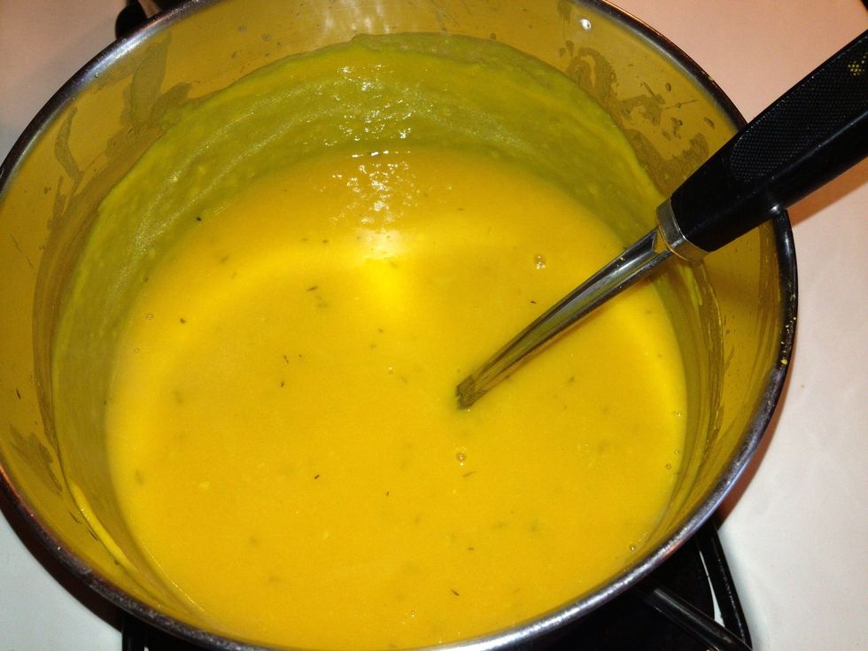 It should look smooth and golden. Add the two cups of cream. Stir or whisk smooth. At this point, it would probably make a good cream soup.