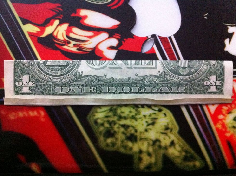 It should now be tucked inside the small fold.