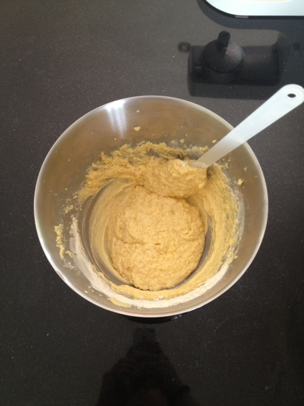 It should slowly come together as more Flour is added.