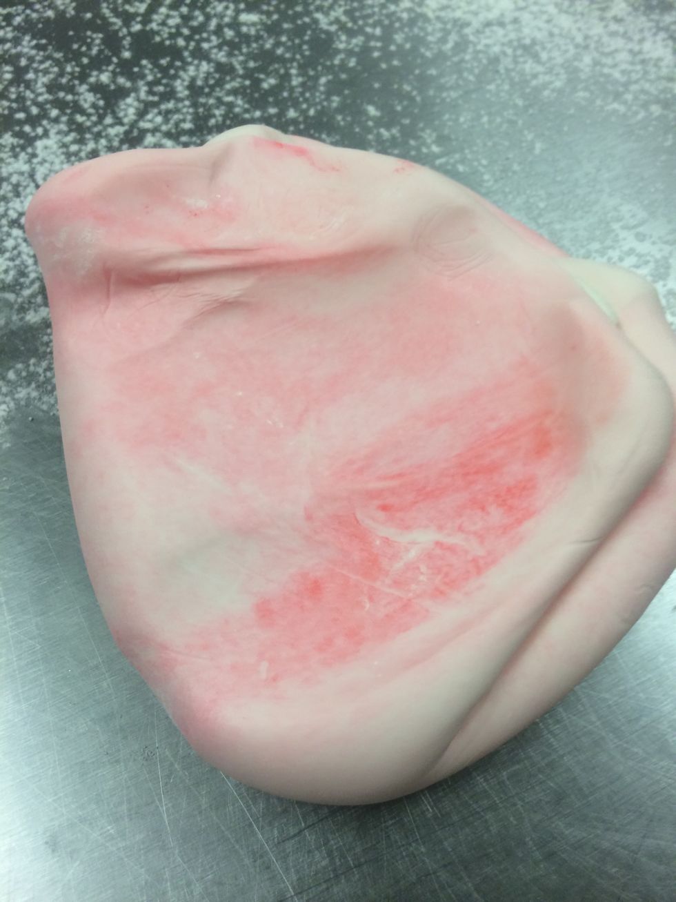 It takes a few minutes to kneed the color into the fondant.