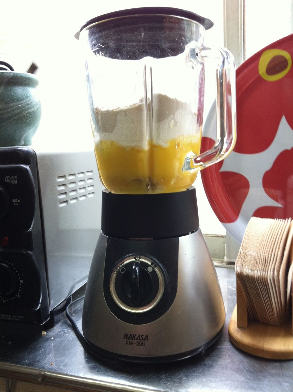 It' time to blend the ingredients together. Be careful not to over-blend. Mix in a few short bursts and finish folding the ingredients together with a spatula.