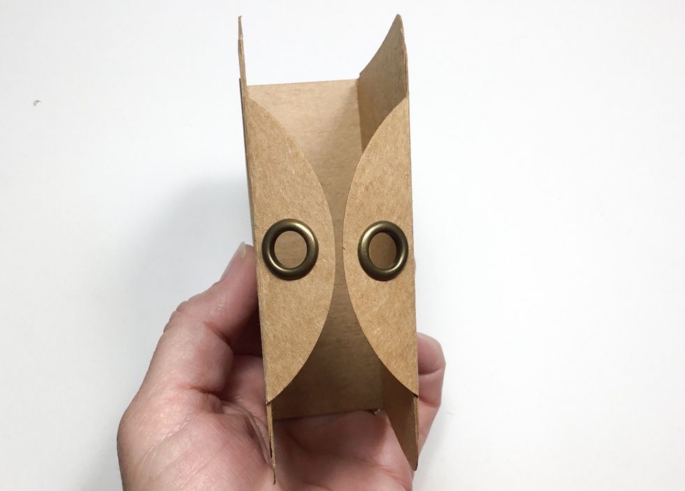 It will close nicely and allow a binder ring to be inserted to hold the album closed.