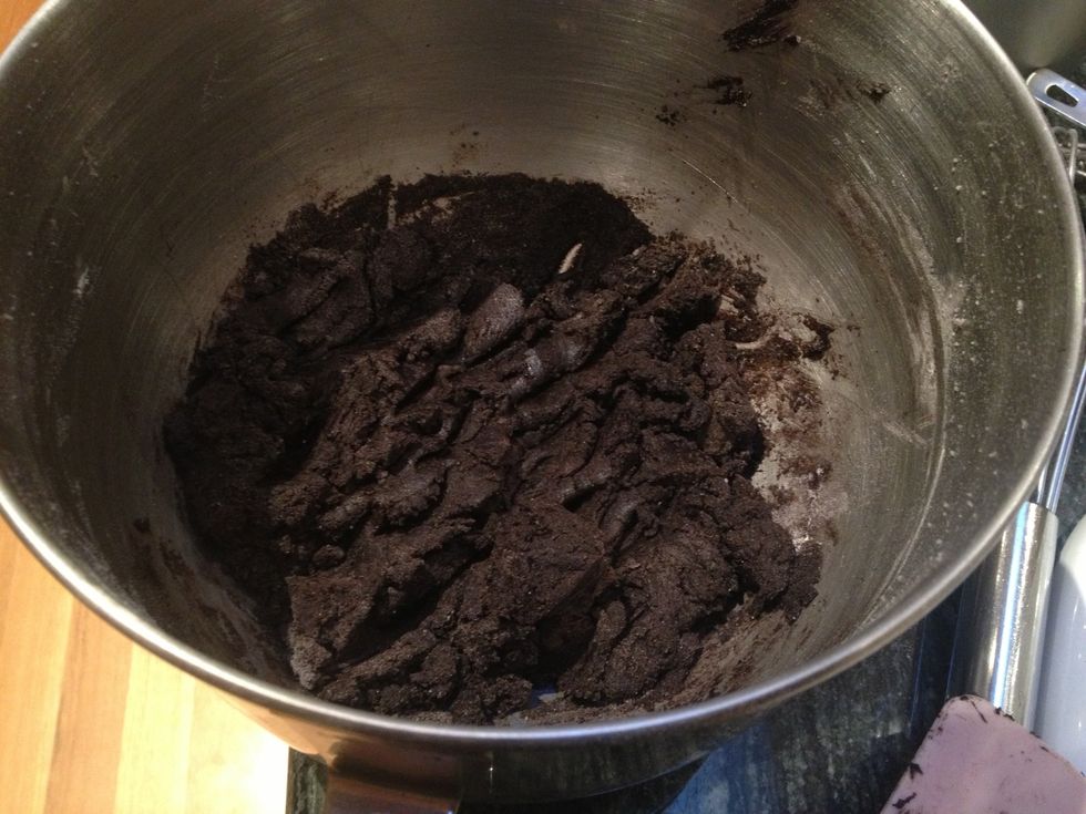 It will get dark and form a stiff dough.