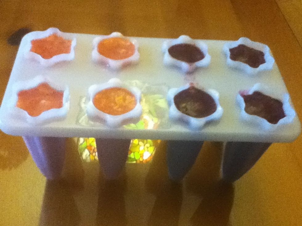 It will look like this at the end. Now you have 8 Popsicles. And 2 flavors! Yum!! \ud83d\ude1d\ud83c\udf66\ud83c\udf53\ud83c\udf52\ud83c\udf47\ud83c\udf4c\ud83c\udf4e\ud83c\udf4a\ud83c\udf48\ud83c\udf60\ud83c\udf4d\ud83c\udf4d\ud83c\udf3d\ud83c\udf50\ud83c\udf51\ud83c\udf4a