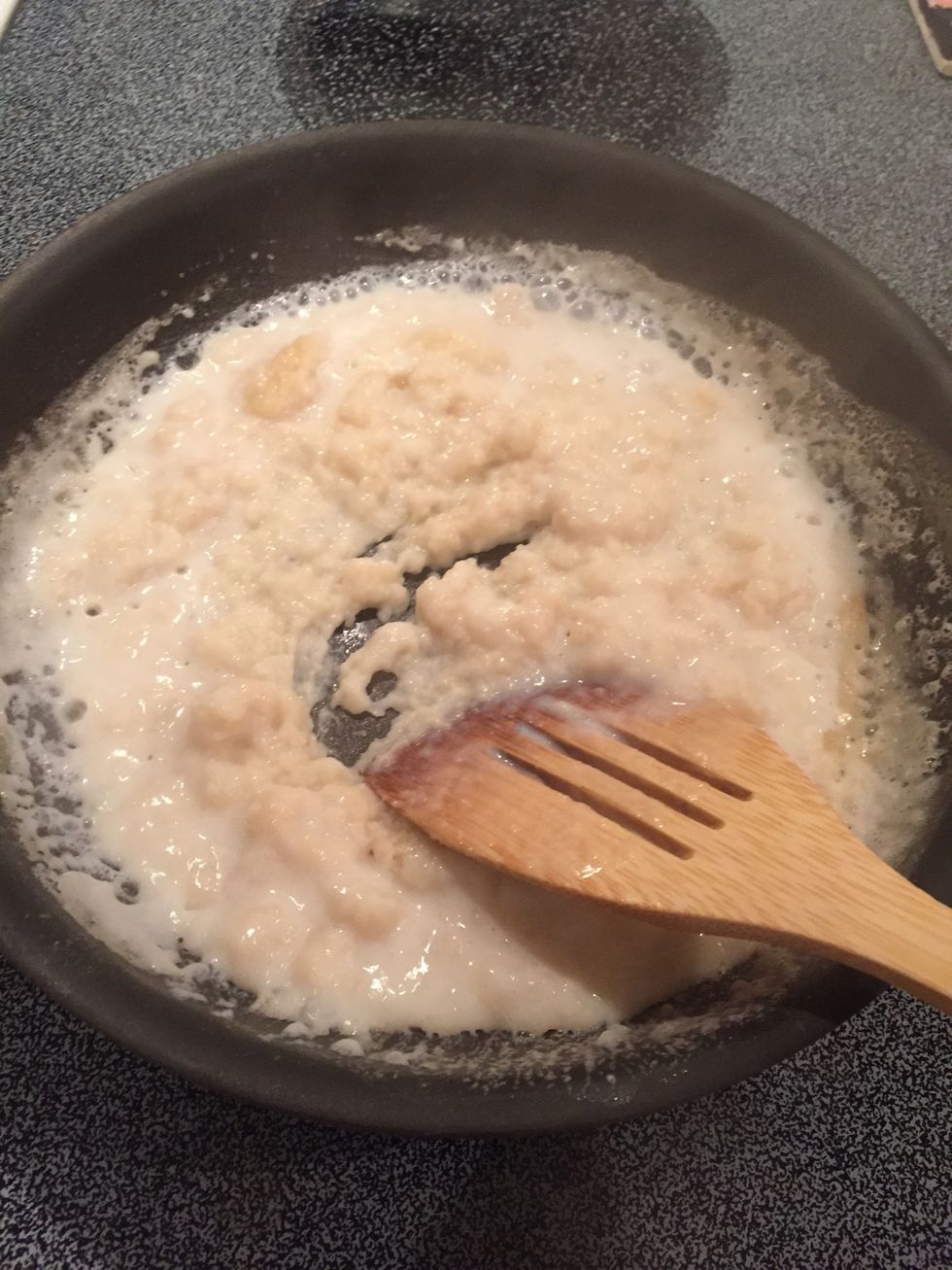 It will thicken quickly, so keep adding milk and stirring well.