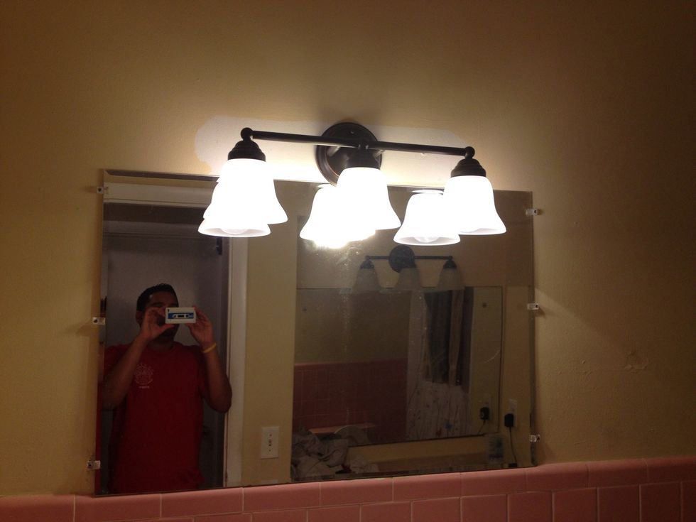 It works... however the problem is that I used the old light placement that was centered for the old mirror and not the new mirror's dimensions.