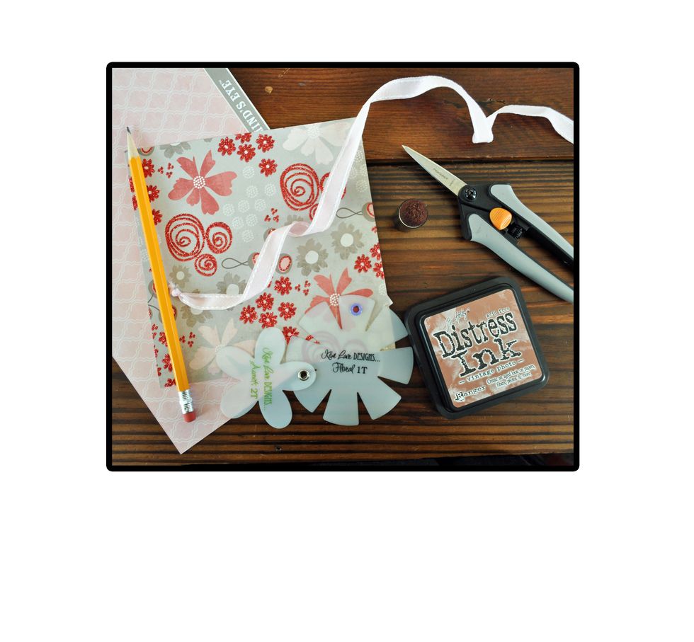 Items you will need to create this project. Patterned paper, Designer Templates or other flowers, pencil, scissors, ribbon, ink, dauber & adhesive.