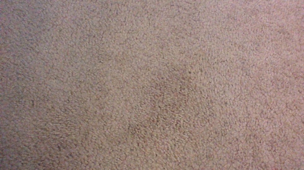 its gone :) wait for it to dry put an old towel or something on it so that you are not stepping on it till it dries.